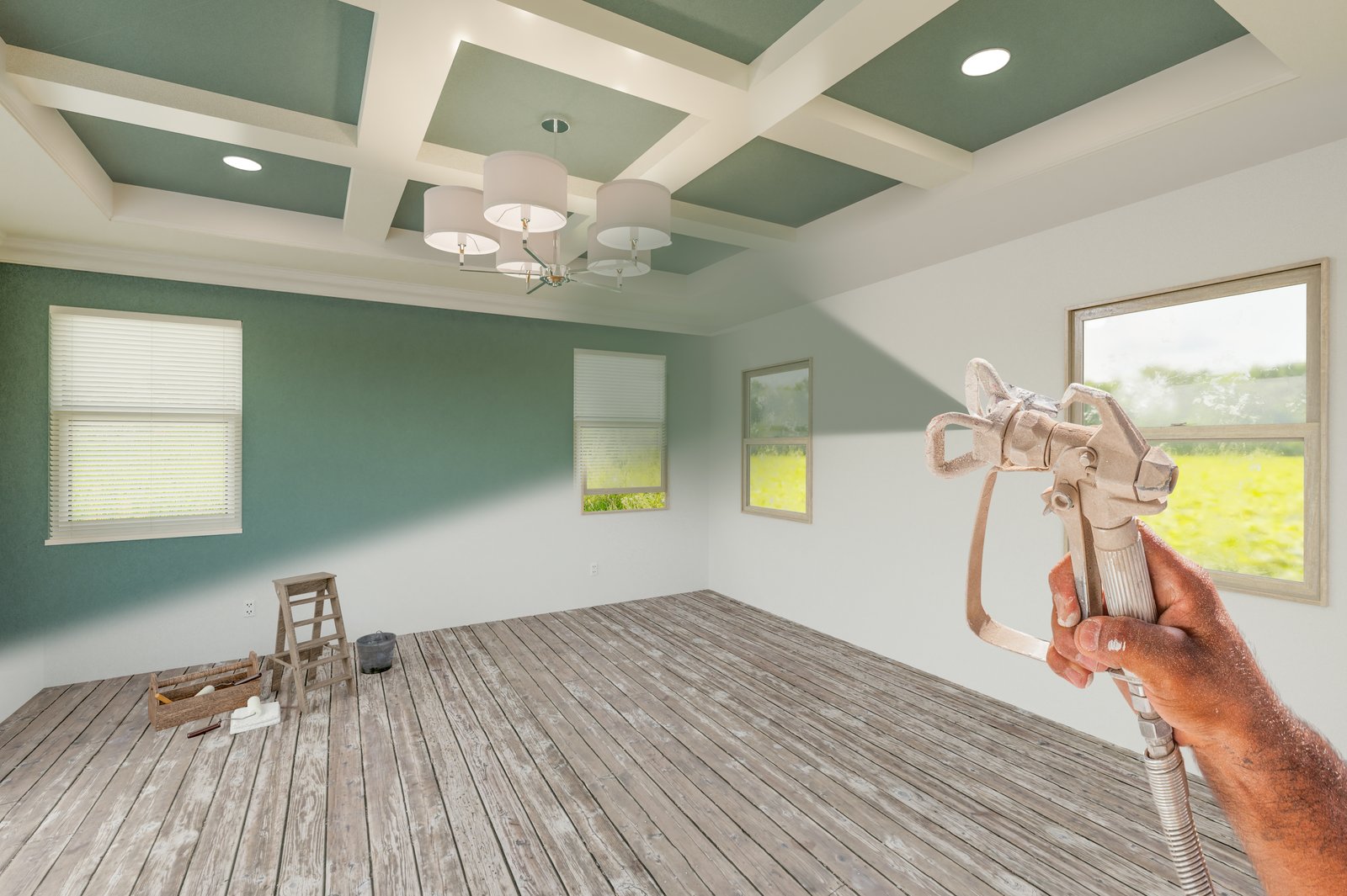 Interior painting in progress on a coffered ceiling and feature wall